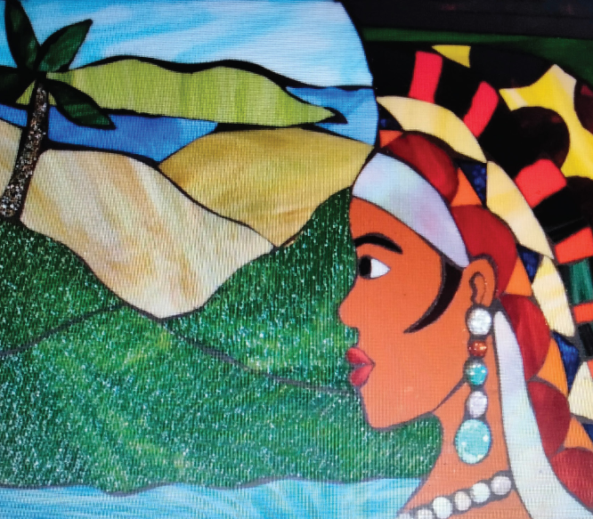A vibrant stained glass artwork depicts a profile of a woman with large earrings and a patterned headdress. She faces right toward a landscape featuring a palm tree, mountain, and sky. The scene is framed with vivid colors including greens, blues, and yellows.